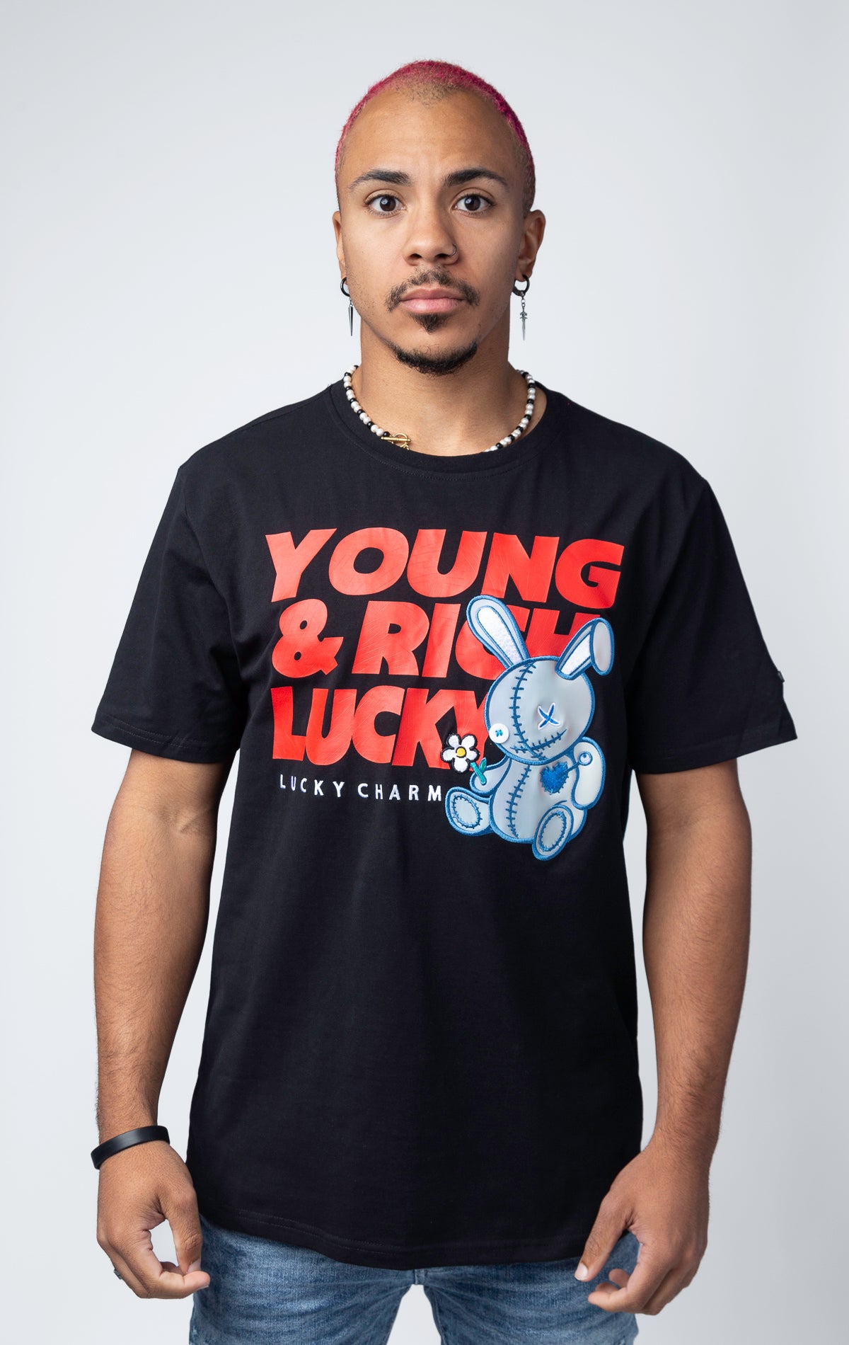 Stylish black T-shirt featuring a motivational 'Young, Rich, and Lucky' slogan
