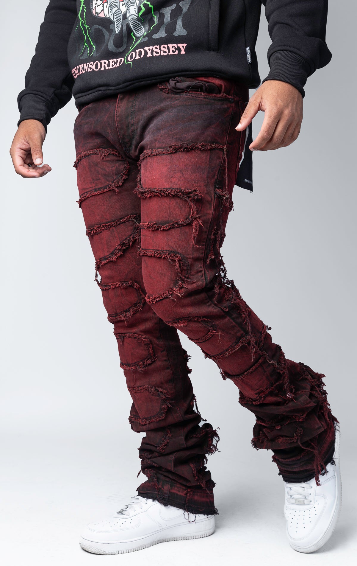 Magma distressed and stacked flare jeans featuring an ombre wash and ripped details
