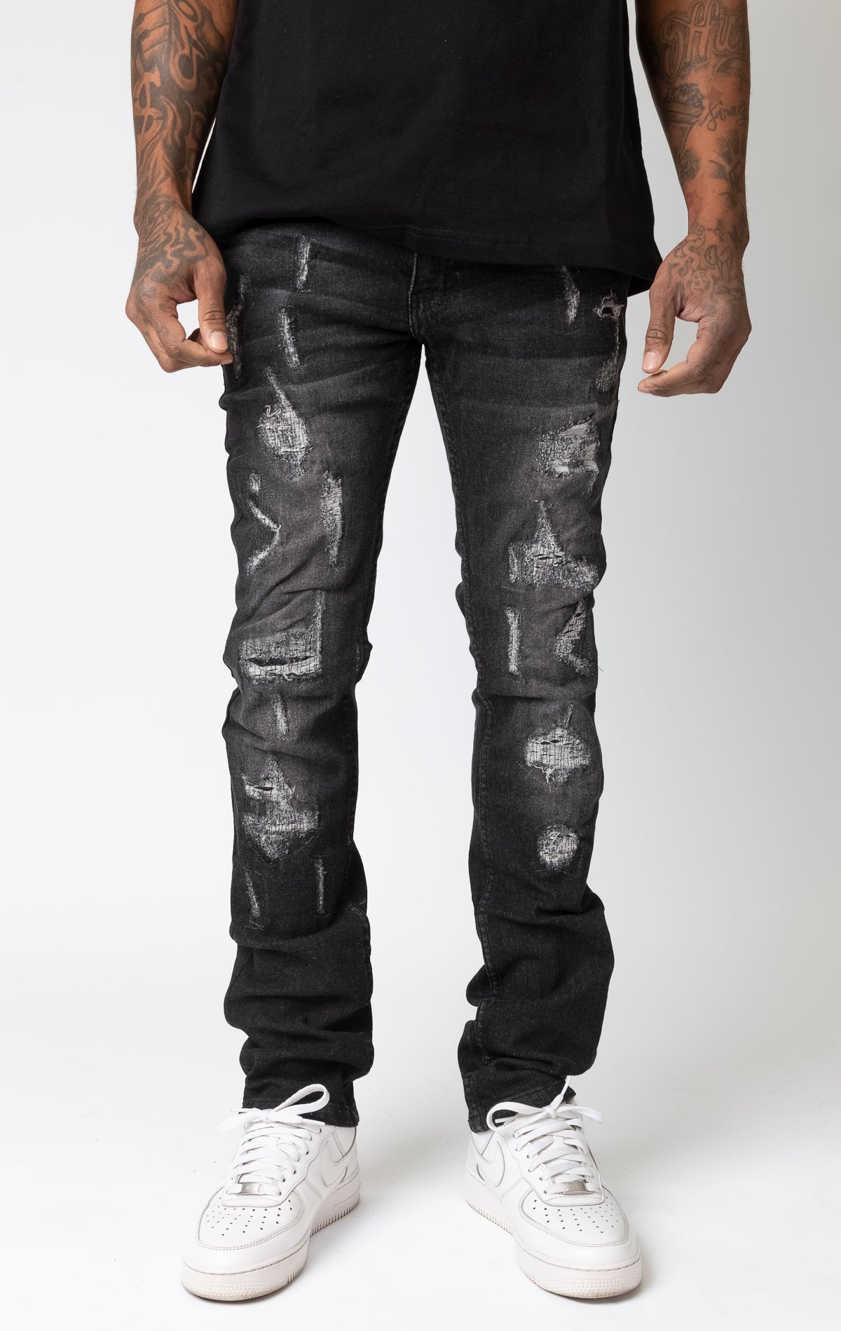 Wash black Frayed rip and repair slim fit denim jeans