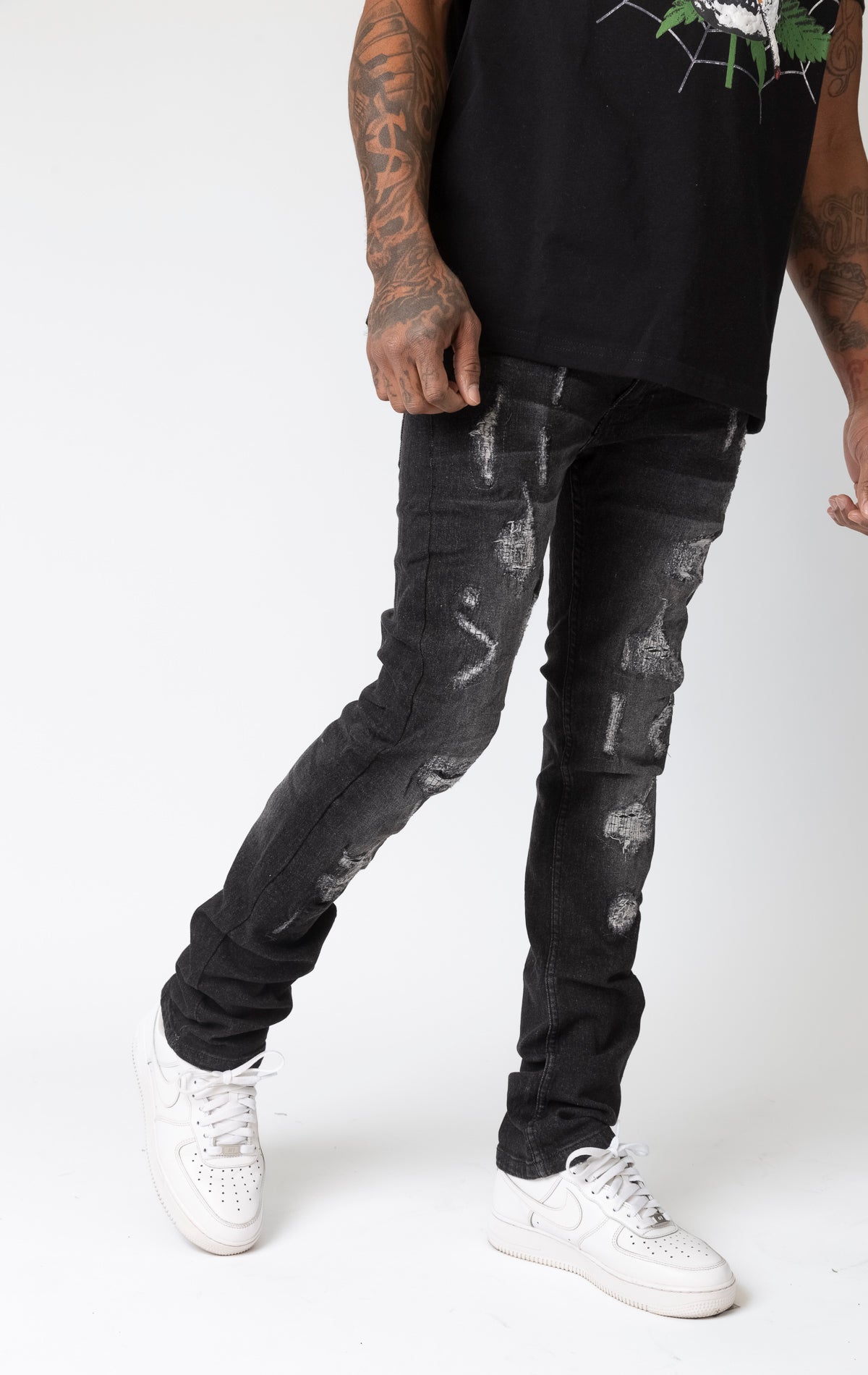 Wash black Frayed rip and repair slim fit denim jeans