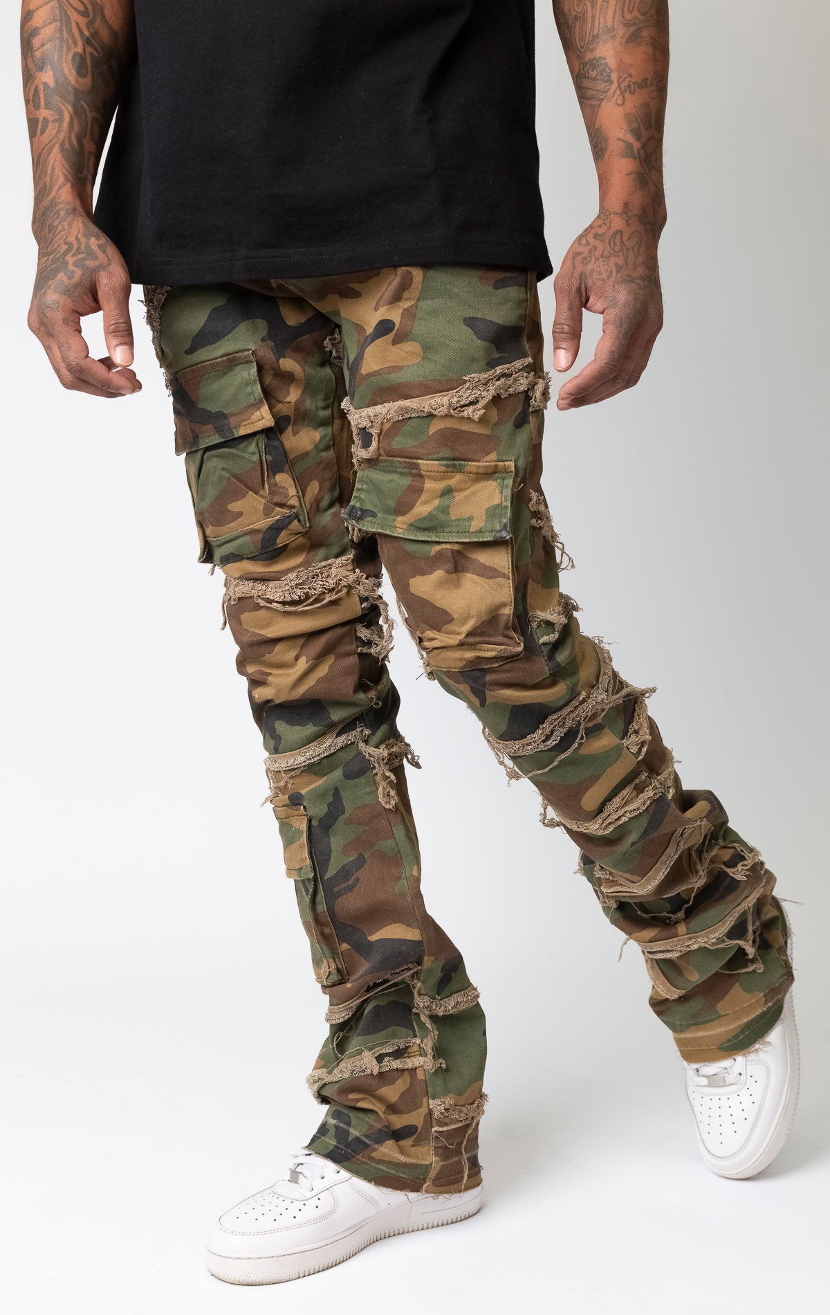 Camo pants with premium stretch, 2% spandex, and premium leather waist label, featuring a button fly