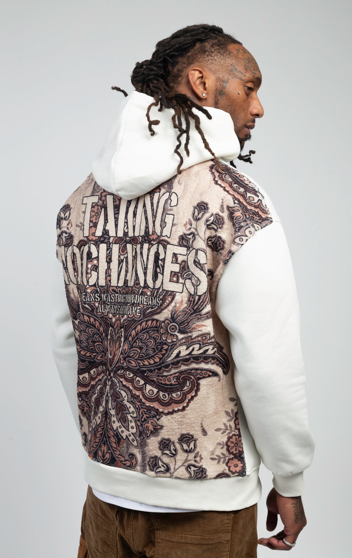 A soft and breathable oversized hoodie featuring vibrant and unique printed designs on the back.