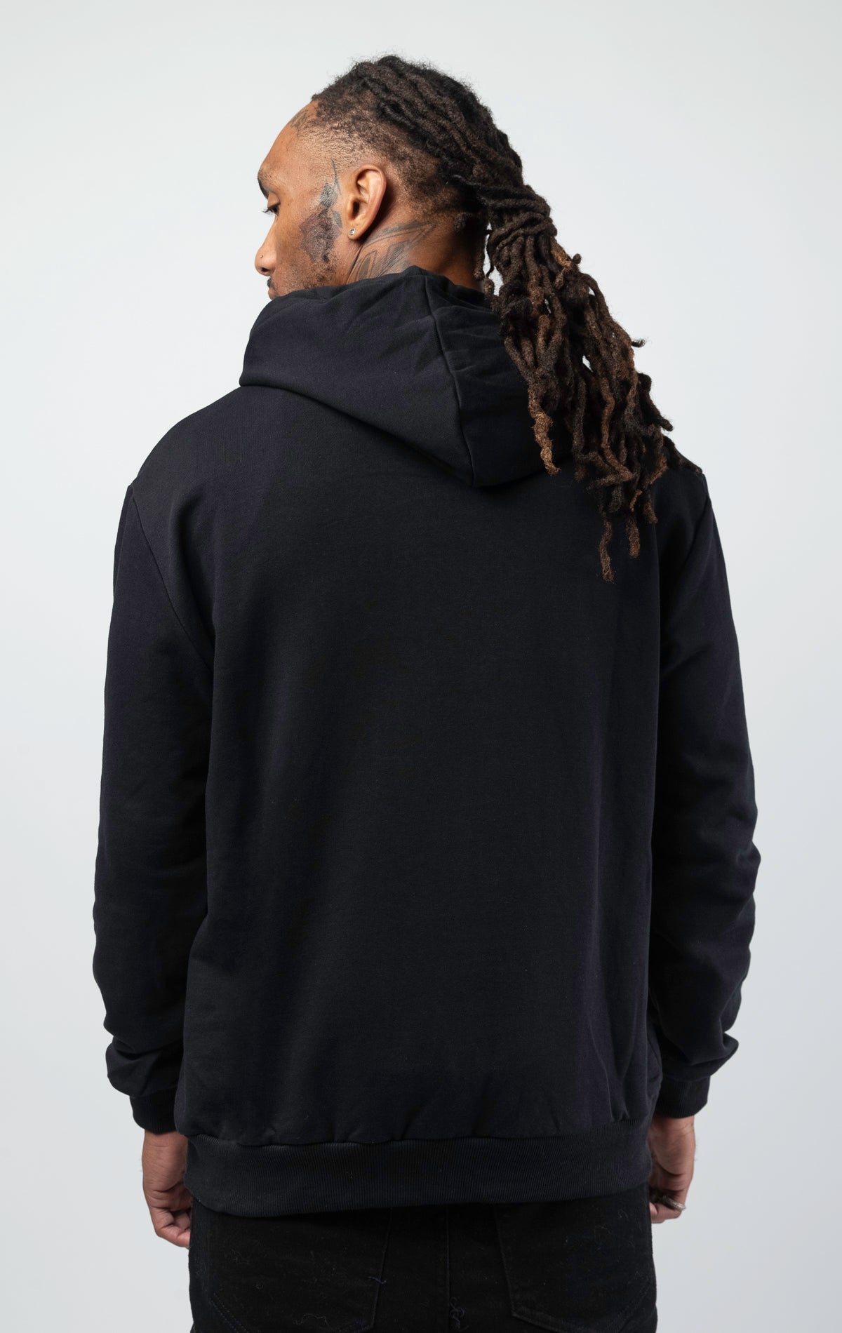back of Black hoodie with leather lucky charm logo. 