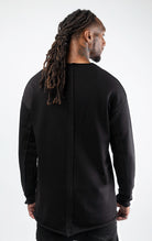 Black sweatshirt with "My Vibe" logo on chest left side.