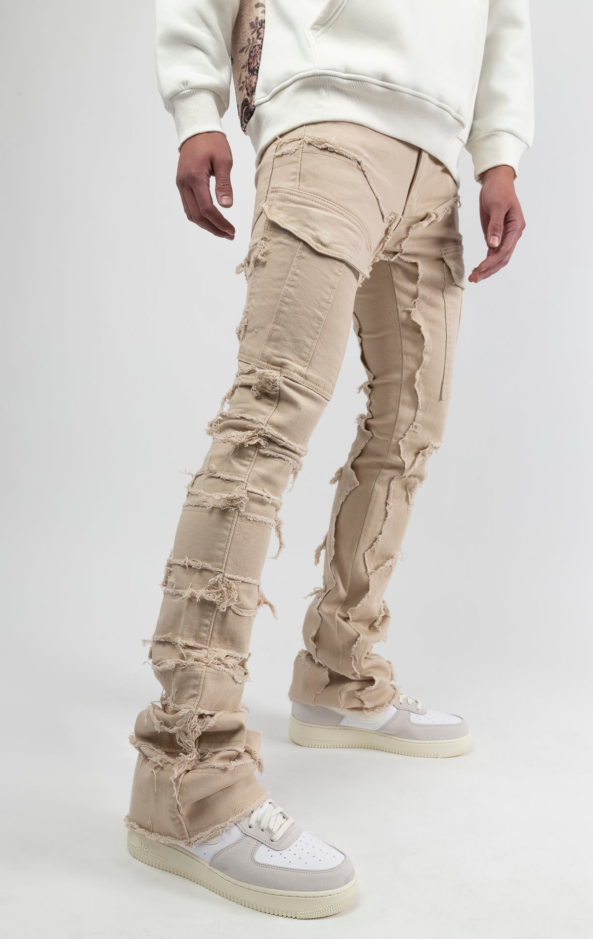 Khaki Fray panel with stitch design, stacked cargo jeans with classic 5 pockets and flared bottom leg.