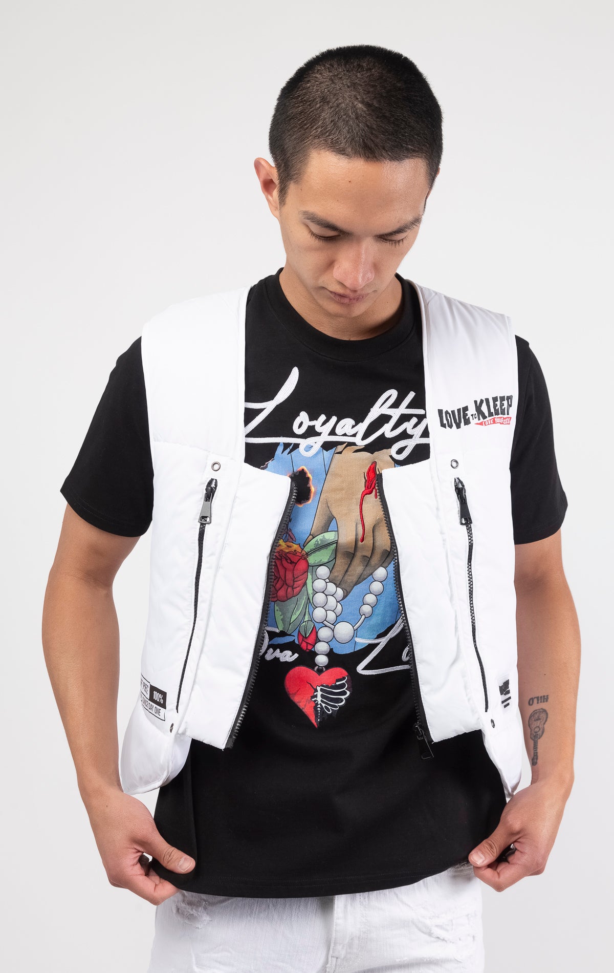 White Premium Cire Padded Vest with 2oz of padding, adjustable straps, and functional front and back pockets. Back features a PHRESH(FRESH) screen print, while the front showcases a Love to Kleep logo and clear rubber patch.