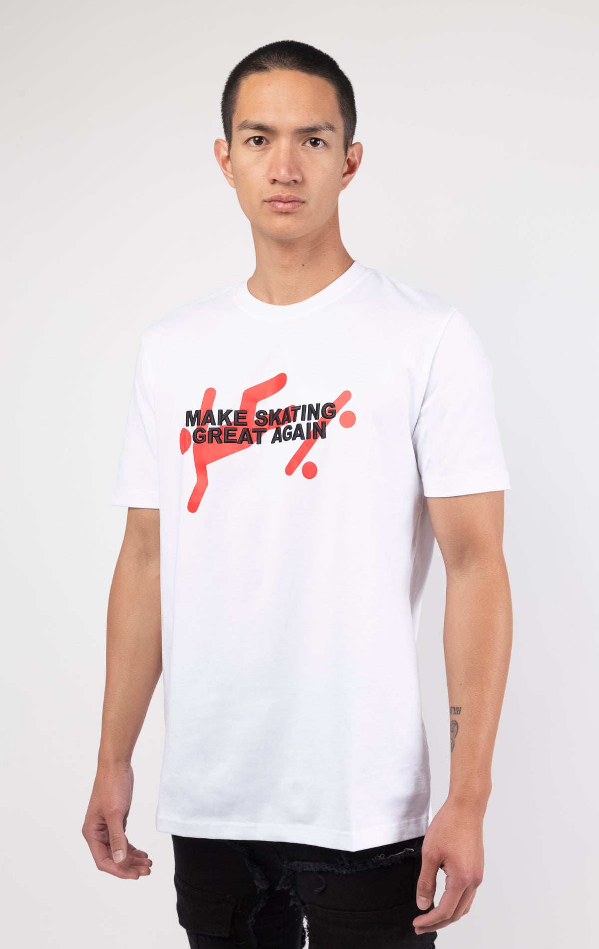 White crew neck t-shirt featuring a front graphic that says "make skating great again" and a back graphic of Rad Boyz.
