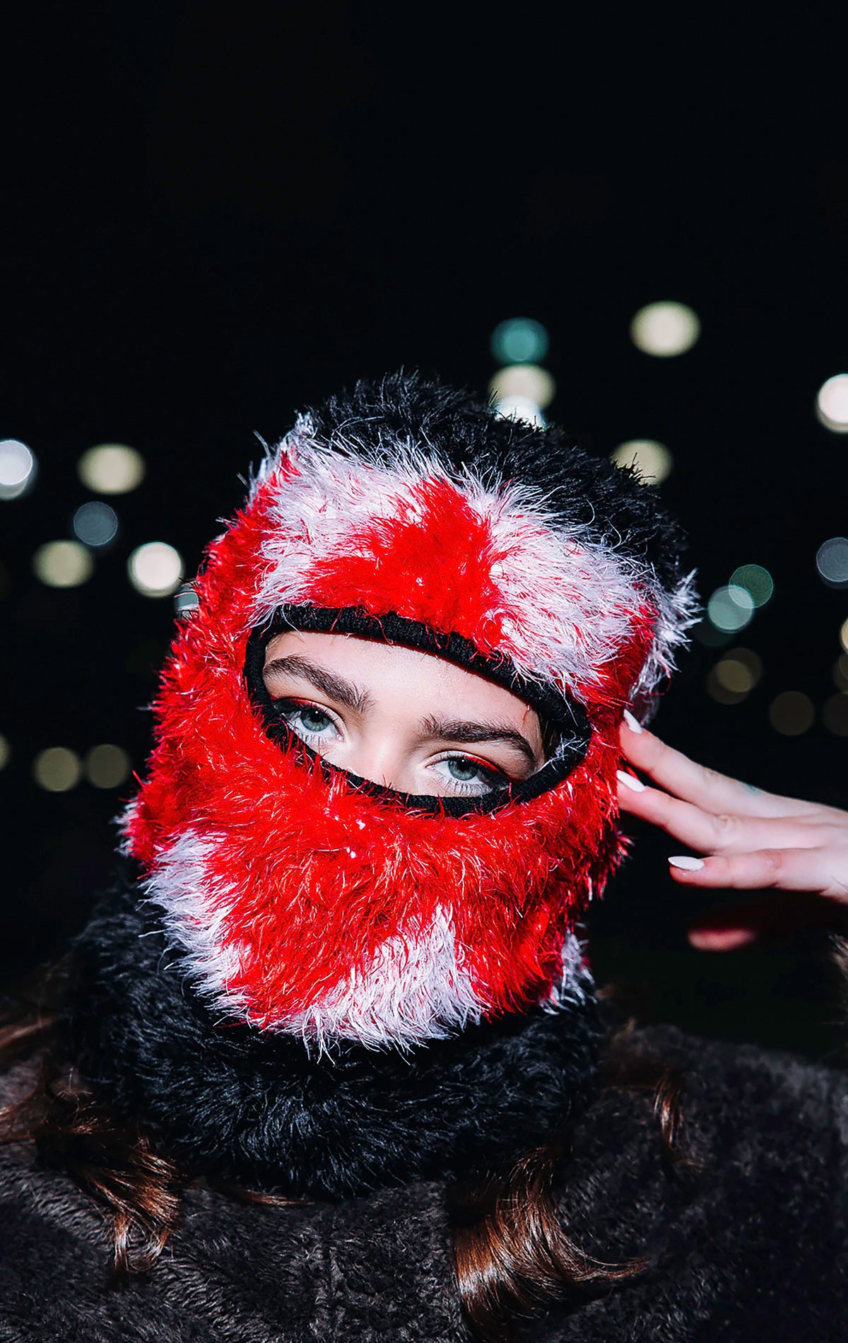Embrace warmth and style while hitting the slopes with this limited-edition cozy ski mask, crafted from a soft and fuzzy fabric.