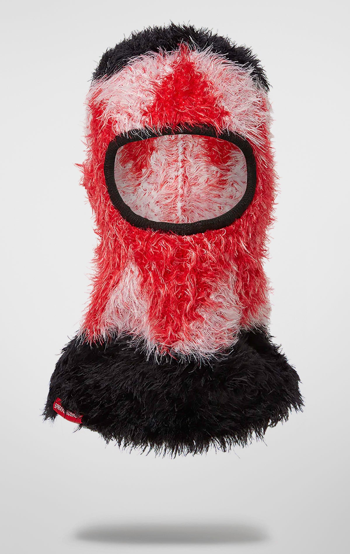 Embrace warmth and style while hitting the slopes with this limited-edition cozy ski mask, crafted from a soft and fuzzy fabric.