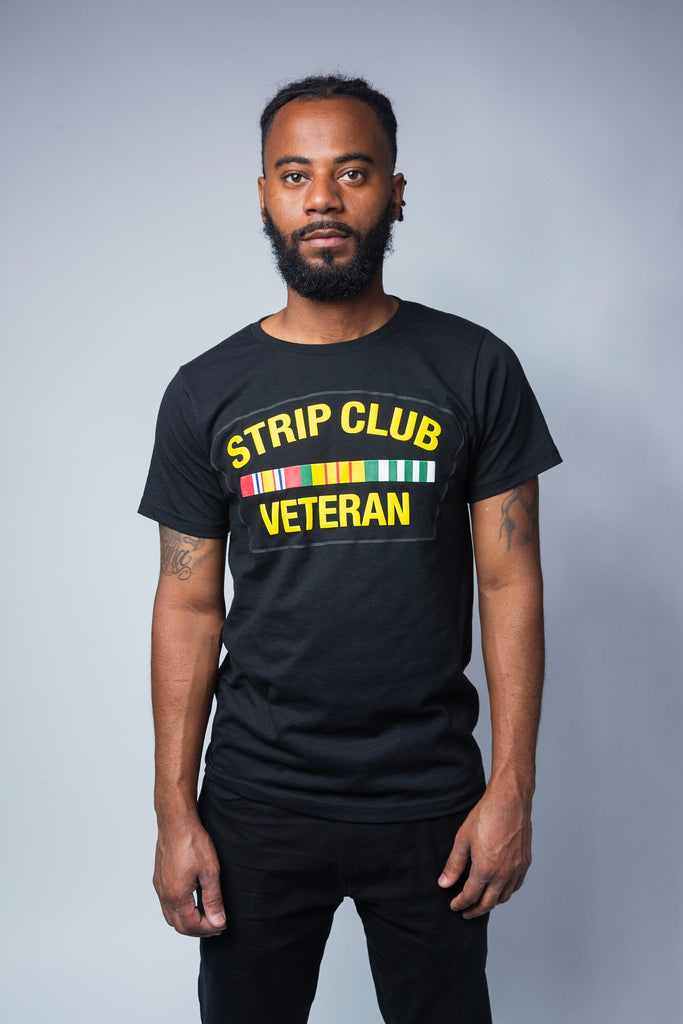 Black "Strip Club Veteran" graphic t-shirt.