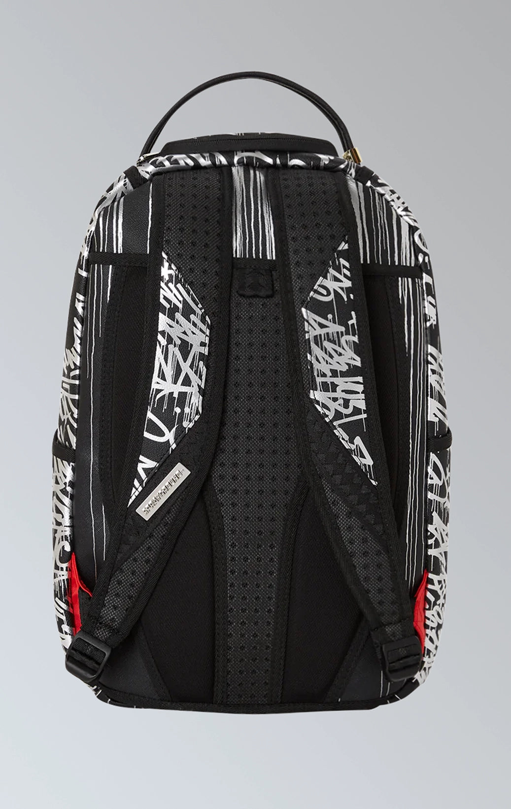 Stylish and functional Sprayground backpack featuring a metallic chrome finish and bold graffiti-inspired graphics. It has a spacious main compartment, front zippered pocket, side pockets, hidden zippered pocket, separate velour-lined sunglass compartment, ergonomic mesh back padding, adjustable straps, metal zippers and hardware, reflective Sprayground logo, and unique Street Life design.