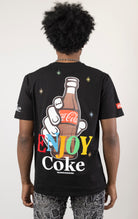 Men's black short-sleeve crew neck t-shirt in a variety of colors. The shirt features a Coca-Cola logo graphic on the front. The graphic is heat-sealed and the tee is made from a blend of 94% cotton and 6% spandex.