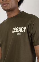 Men's crew neck t-shirt in a solid olive green color. The shirt has short sleeves and is made from 100% cotton.