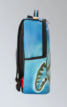 Sprayground backpack with a vibrant Jurassic Island design,