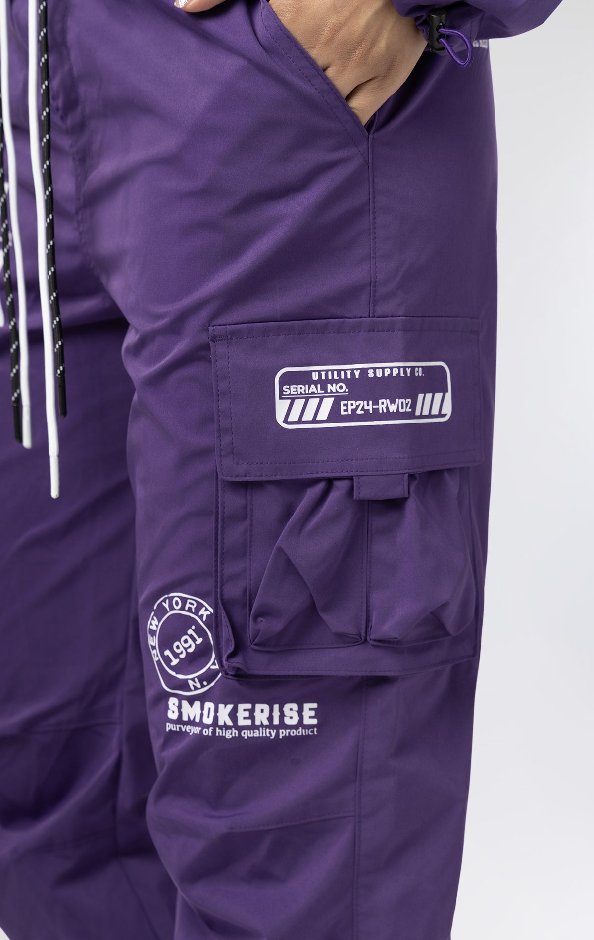 White stacked cargo pants in purple