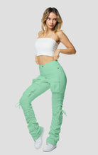 Mint High rise strap bootcut twill pants.