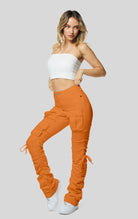 Orange High rise strap bootcut twill pants.