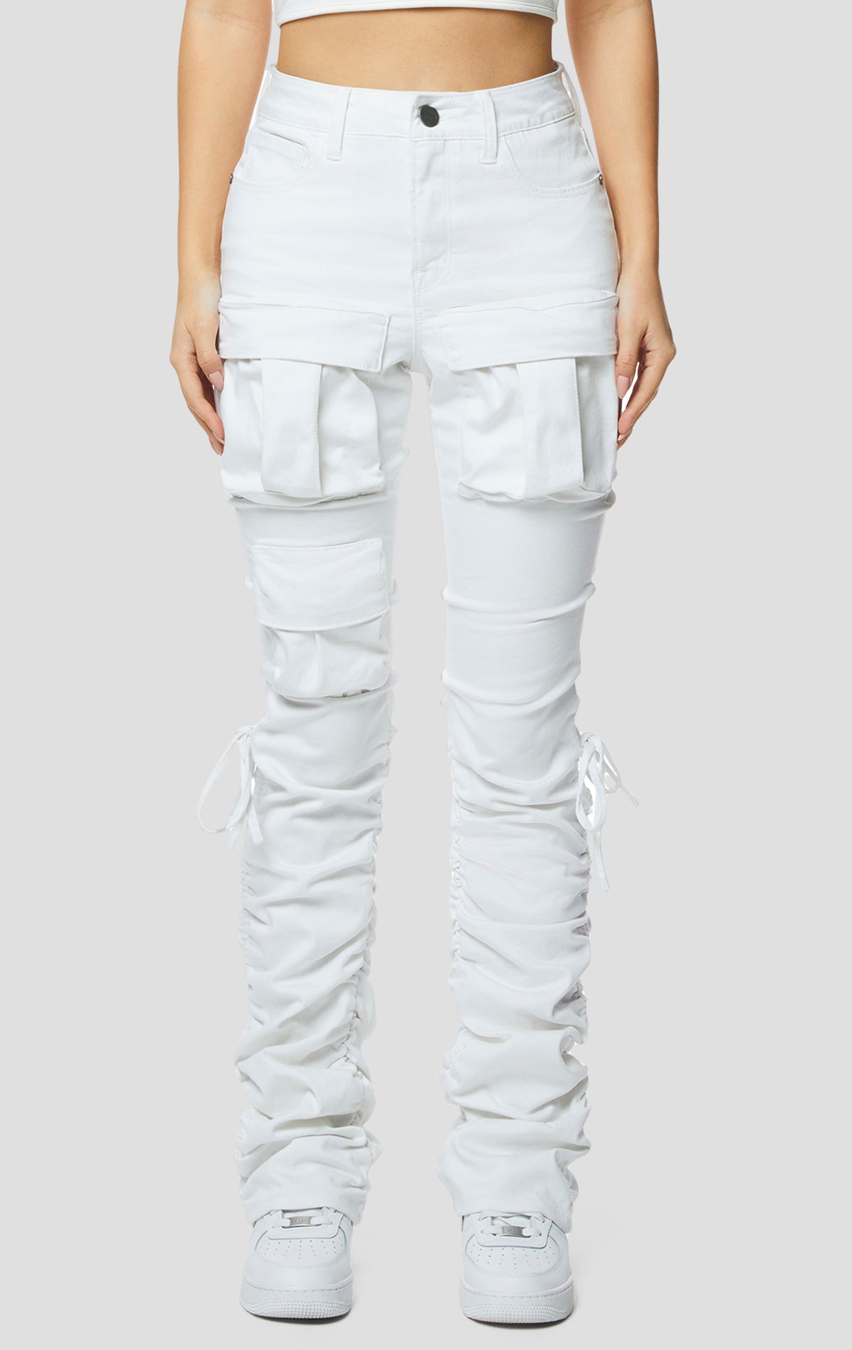 White High rise strap bootcut twill pants.