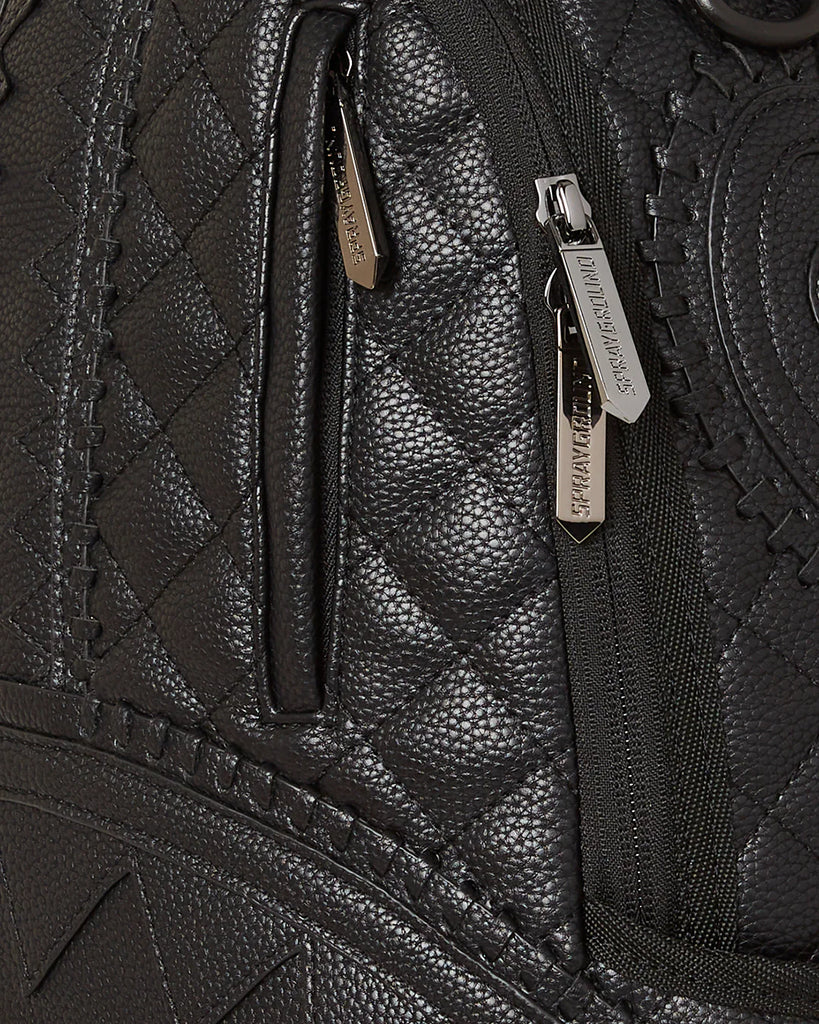 black riviera patterned backpack zipper detail