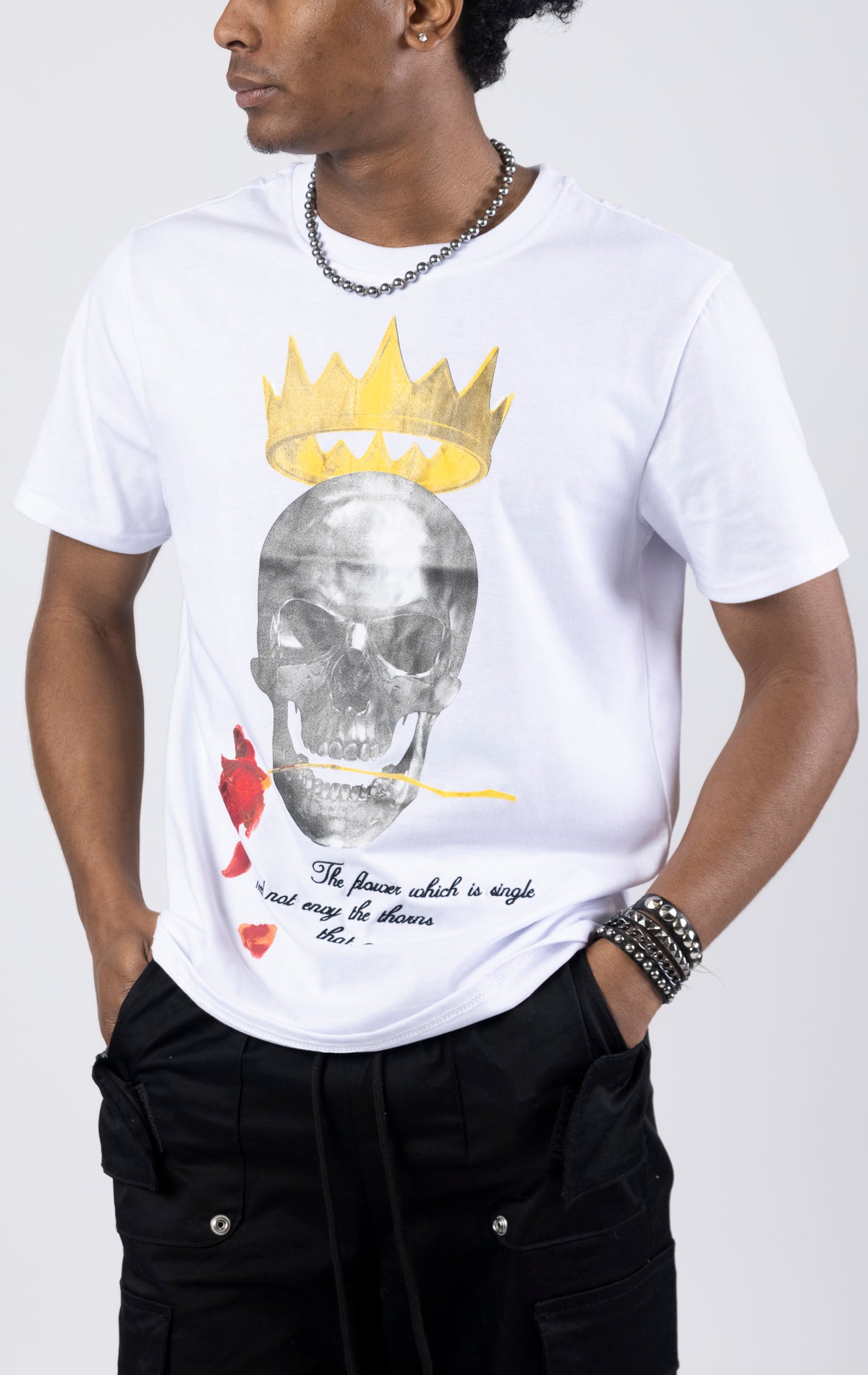 Graphic crewneck t-shirt in white featuring a skull king design on the front. The shirt is made from a blend of 65% polyester and 35% cotton.