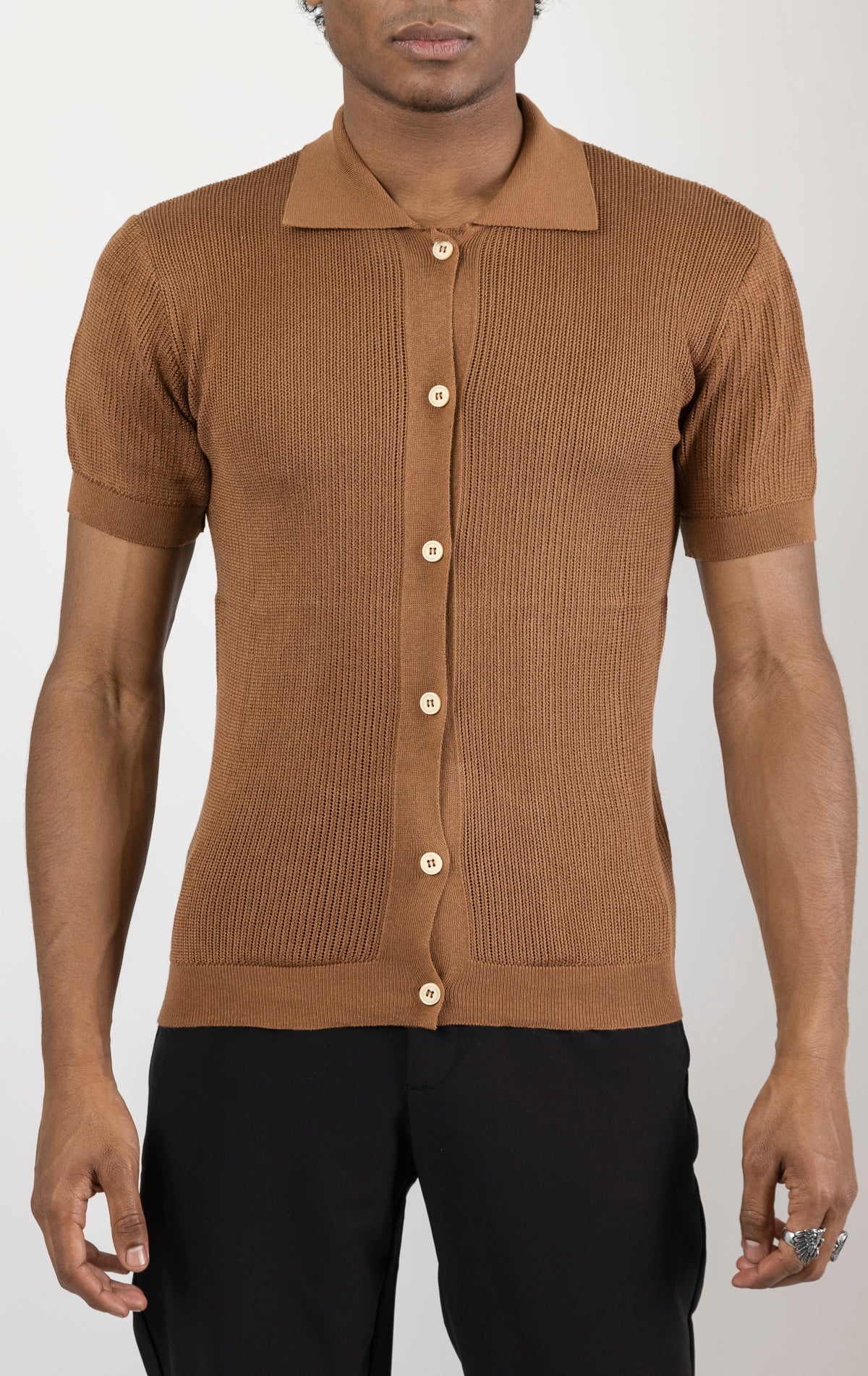 Men's see-through button-down mesh top in brown. The top is made from a 50% cotton, 50% acrylic blend and features a tailored fit with a sheer mesh fabric and button-down closure.