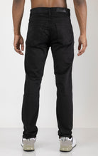 Men's super soft 5-pocket style pants in black color. The pants are made from a 98% cotton, 2% elastane blend and feature a tailored fit with a hint of stretch, classic 5-pocket styling (two front pockets, two back pockets, and a coin pocket).