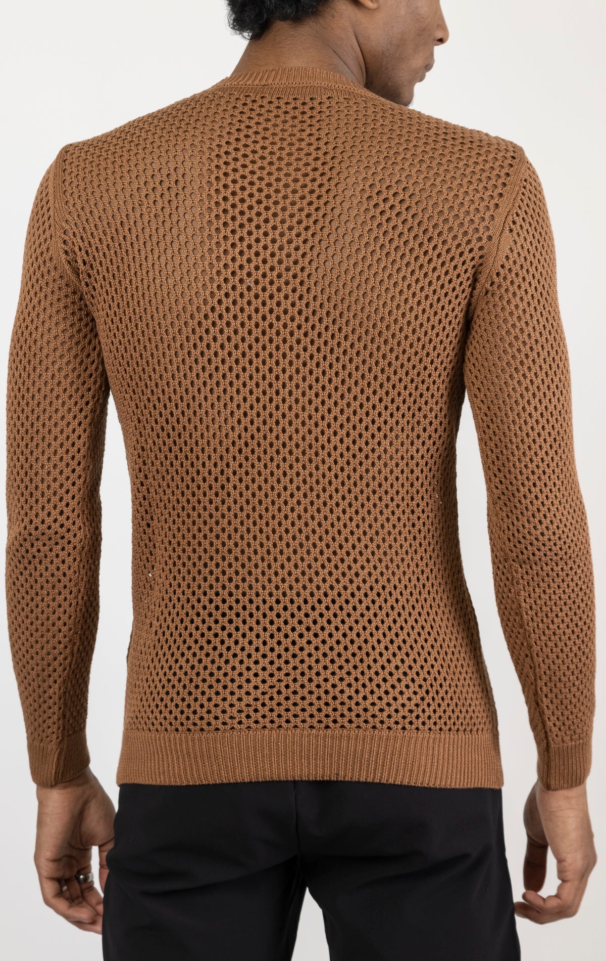 Men's see-through fishnet muscle fit shirt in brown. The shirt is made from a 50% cotton, 50% acrylic blend and features a muscle fit silhouette with a see-through fishnet fabric design.