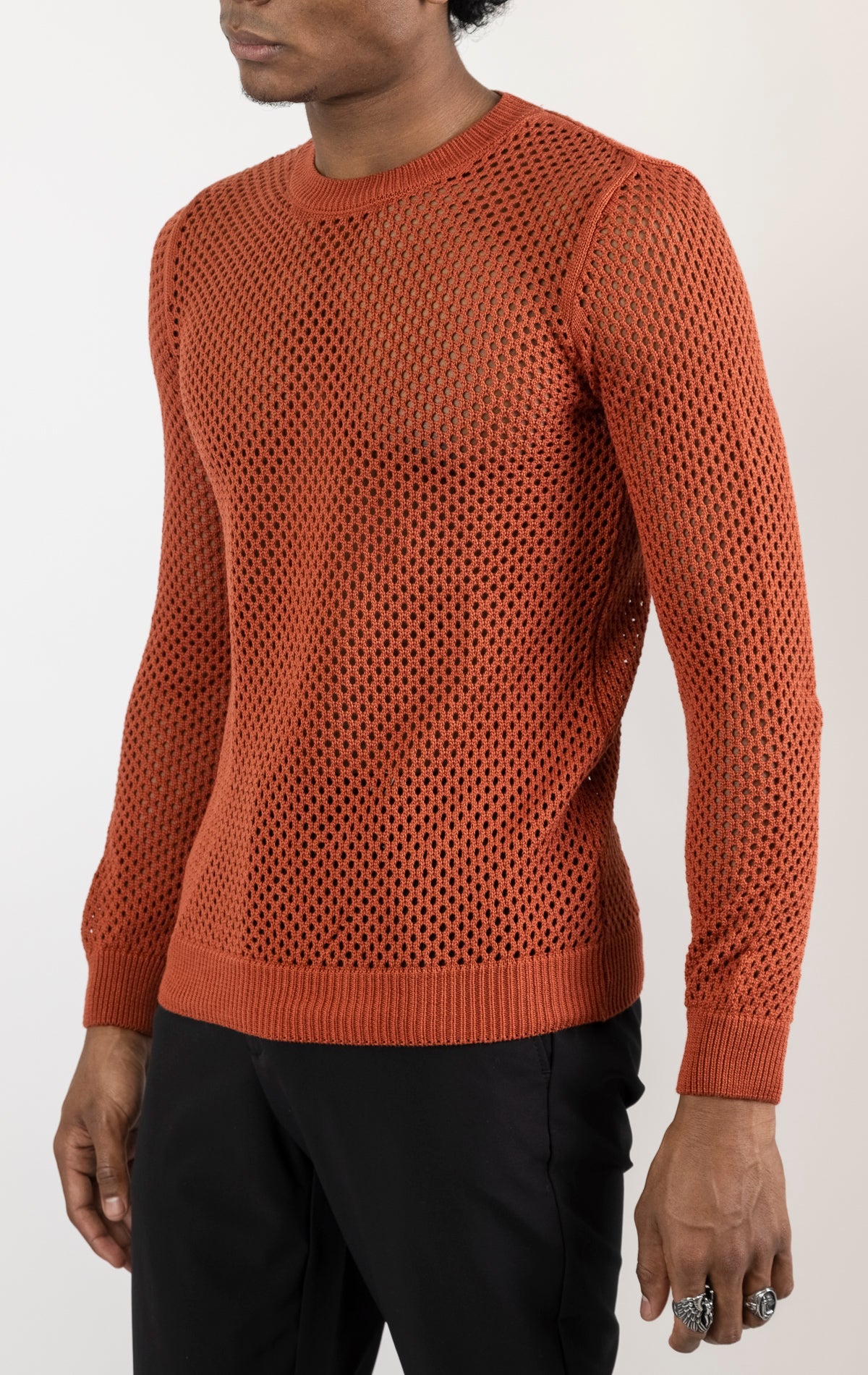 Men's see-through fishnet muscle fit shirt in copper. The shirt is made from a 50% cotton, 50% acrylic blend and features a muscle fit silhouette with a see-through fishnet fabric design.