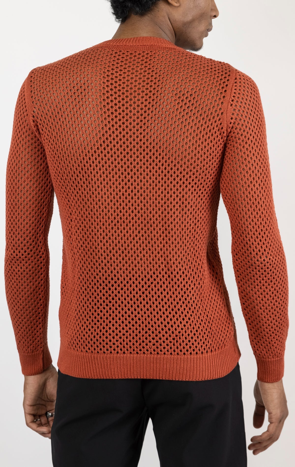 Men's see-through fishnet muscle fit shirt in copper. The shirt is made from a 50% cotton, 50% acrylic blend and features a muscle fit silhouette with a see-through fishnet fabric design.