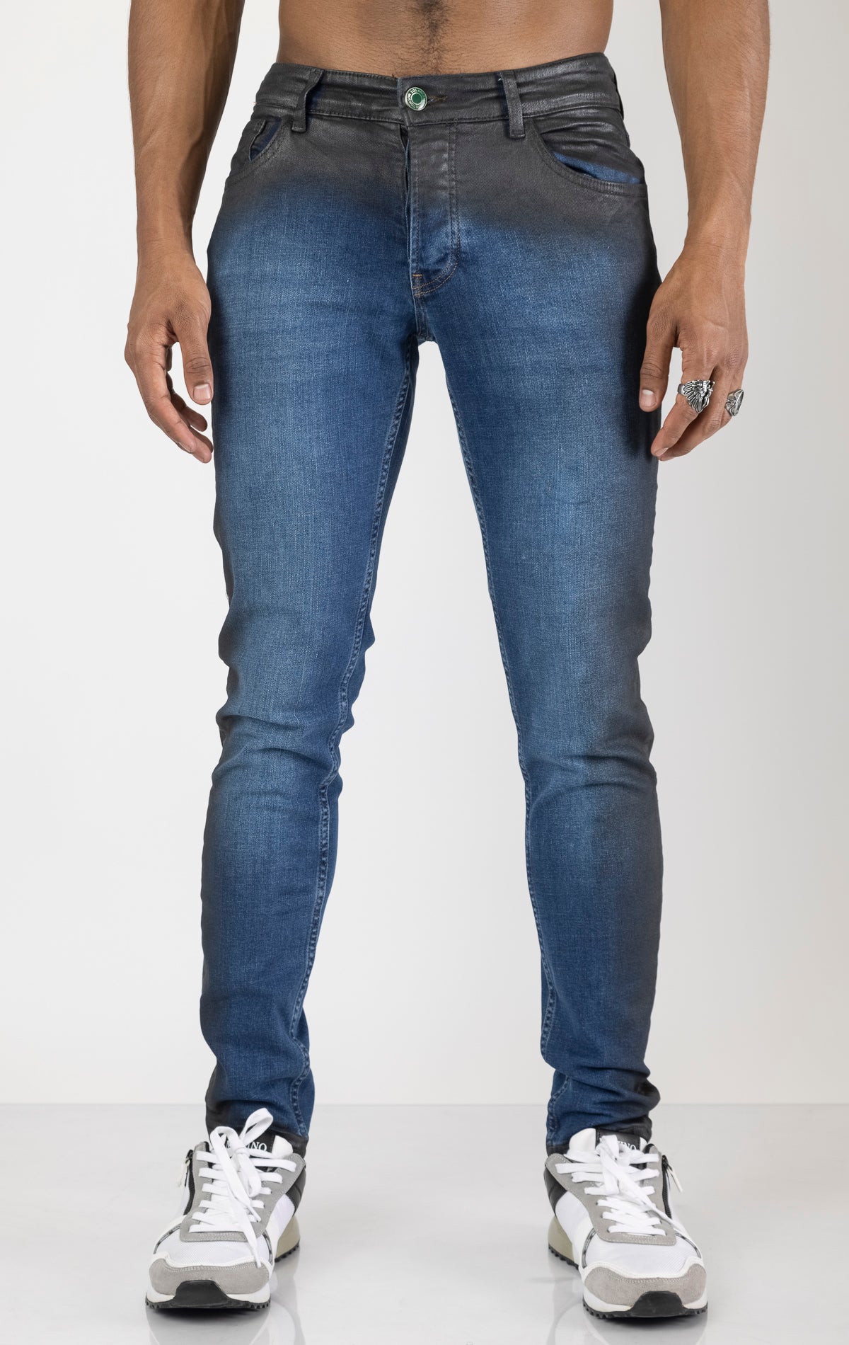 Men's side waxed tapered jeans in blue. The jeans are made from premium quality denim (98% cotton, 2% lycra) and feature a tailored fit, meticulously applied waxed detailing along the side seams, and a tapered leg.