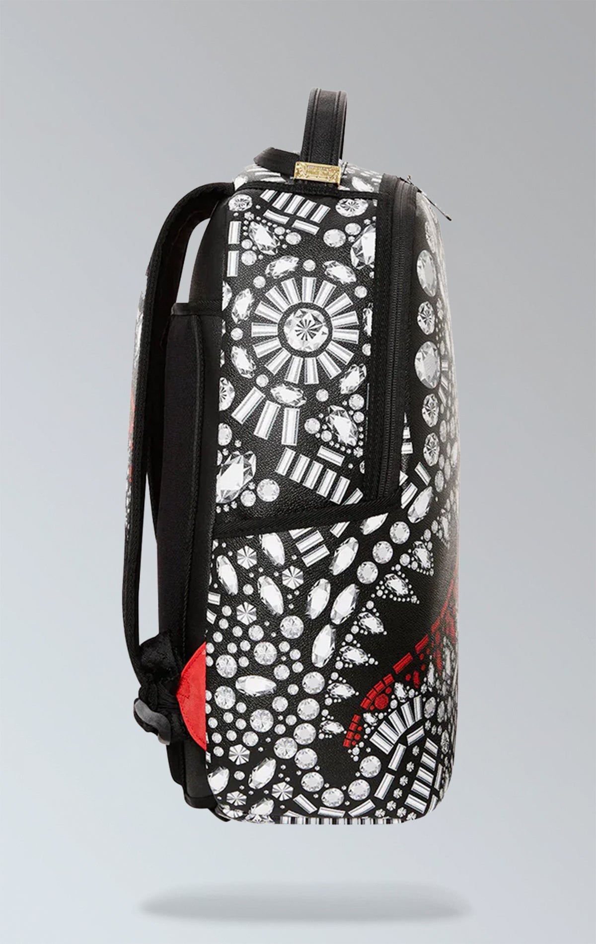 Sprayground Crazy Diamond backpack featuring an all-over print of a fierce diamond-toothed shark