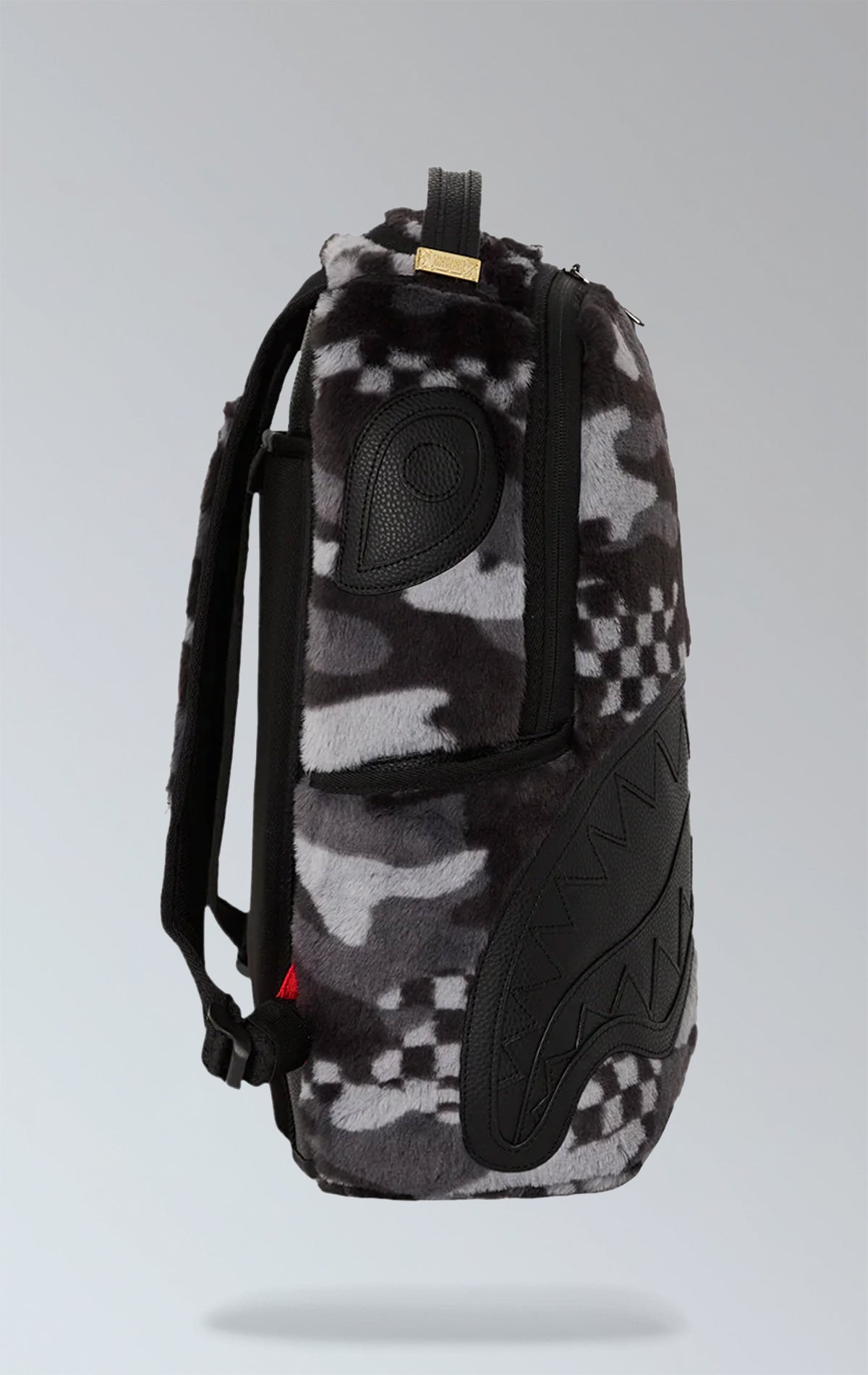 Multicolored Sprayground Flock 3AM backpack with separate laptop and sunglasses compartments, padded back, and side pockets.