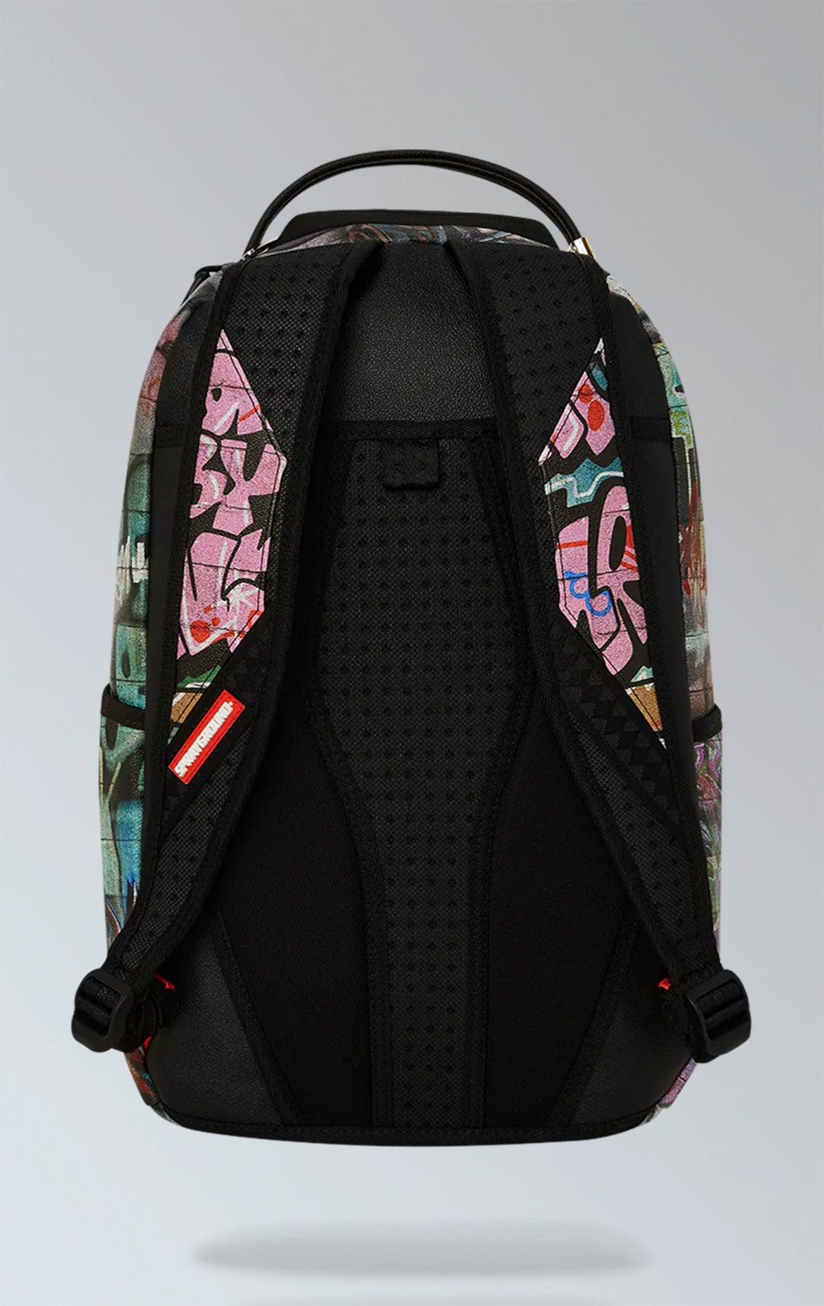 Sprayground limited-edition backpack celebration of 30 years of hip-hop group Naughty by Nature. It features a bold and vibrant design with the iconic Naughty by Nature logo and graphics from their album "Hip Hop Hooray."