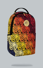 Sprayground Tigers on My Mind Backpack. The backpack is made from durable faux leather (100% PVC) and features a gold metal plated tiger emblem, a front zipper pocket, side pockets, a zippered stash pocket, a separate velour sunglass compartment, ergonomi