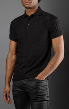 Black Men's regular-fit, short-sleeve polo shirt. The shirt features a seamless Greek pattern and a classic polo design